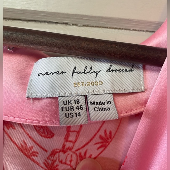 Never Fully Dressed
Pink La Mer May Midi Dress Size 14. - Picture 6 of 16